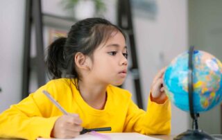 Child engaged in speech-focused play therapy session in Phnom Penh, Cambodia